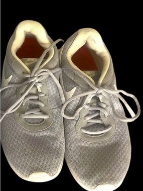 Gray and white Nike sneakers size 8